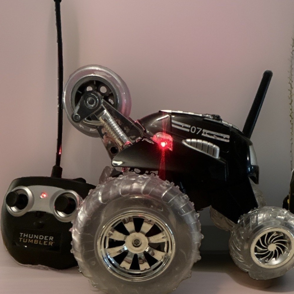Sharper Image Thunder Tumbler RC Car Black 360° Spinning Stunt Truck w/ Remote